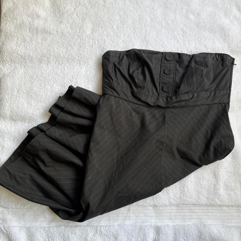 black pinstripe mini skirt with button detail